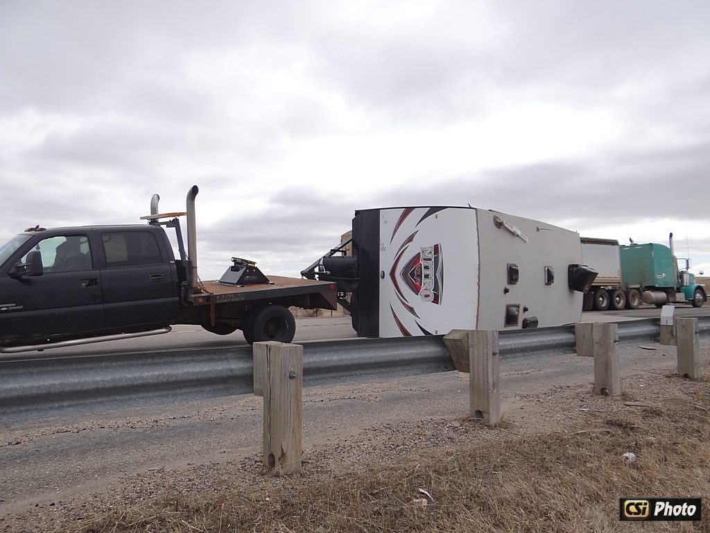 Wind tips trailer April 2, 2015 Hwy 281 Truck Bypass - CSi Photo